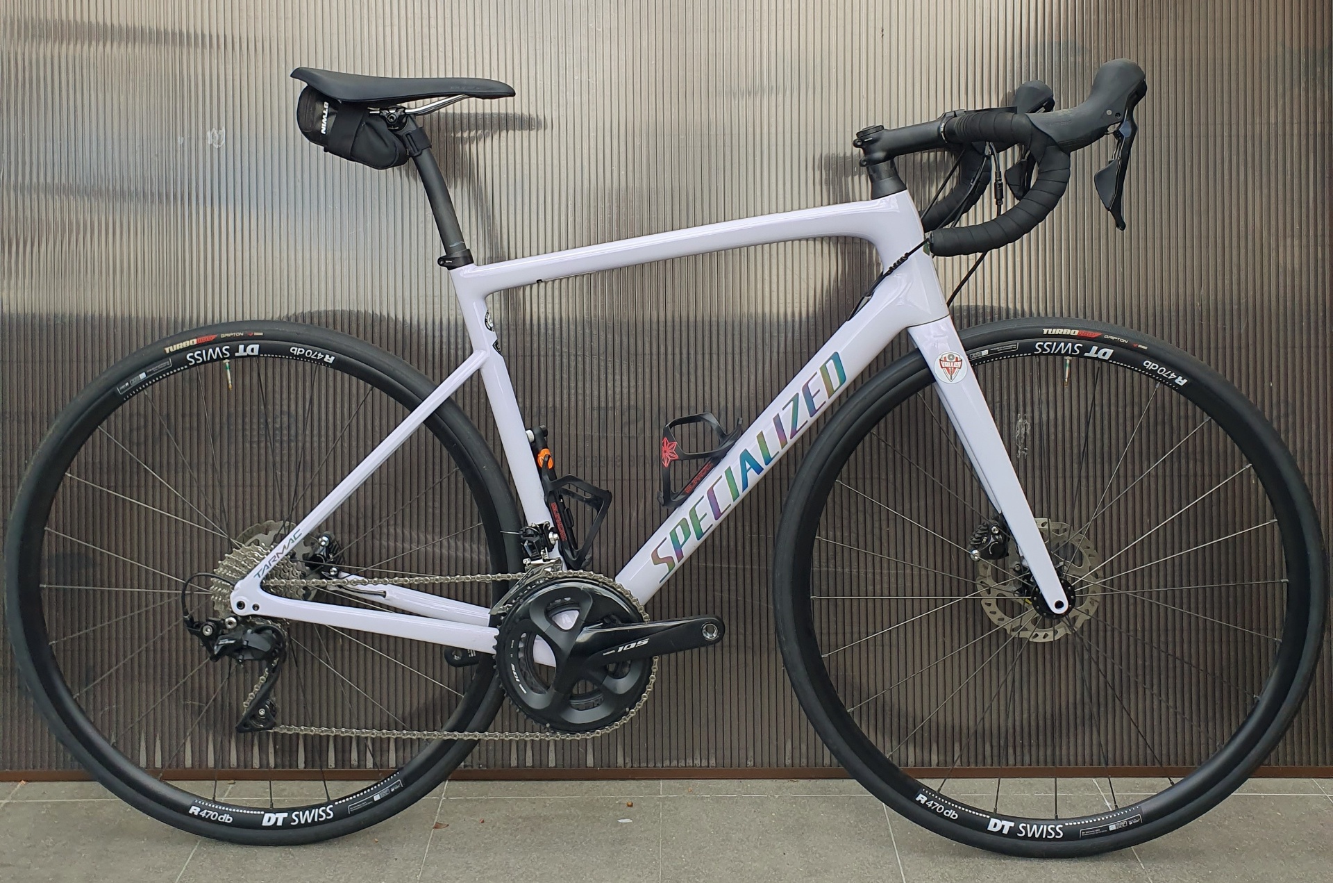 White Specialized Tarmac disc road bike with DT Swiss wheels